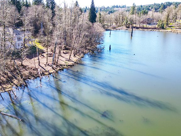 House has its own private shoreline area. The path goes around the property - great to hike around. Otter, beaver and deer live all year round on property.