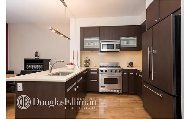 Sold by Douglas Elliman | media 13