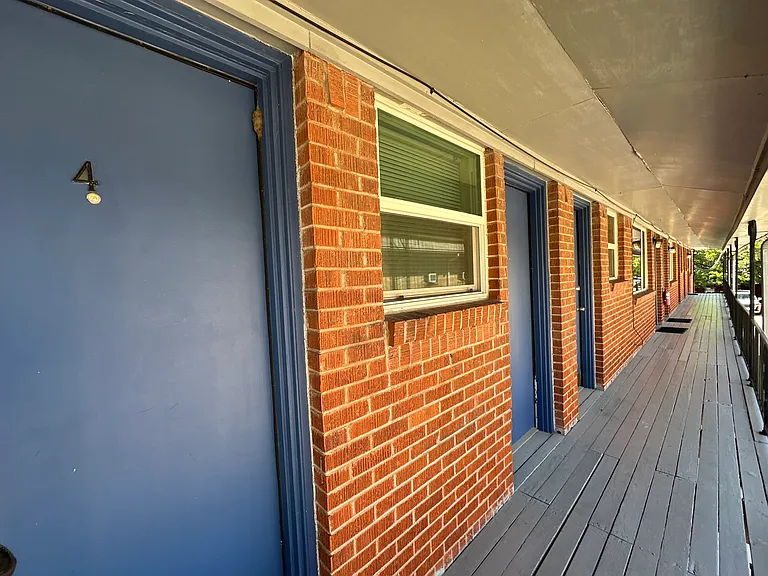 Charming exterior with a welcoming entrance, showcasing the property's curb appeal and inviting atmosphere