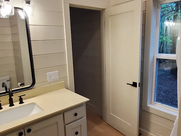 Nice bathroom vanity with storage drawers.