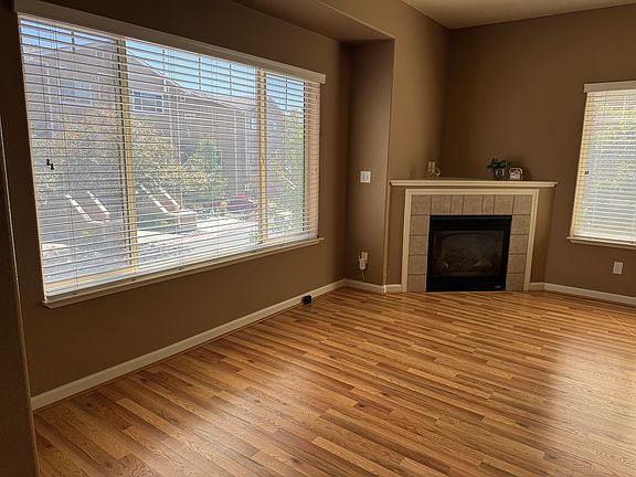 Large living room with gas fireplace.