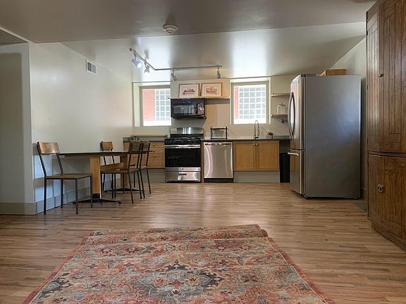 Large kitchen with new appliances.