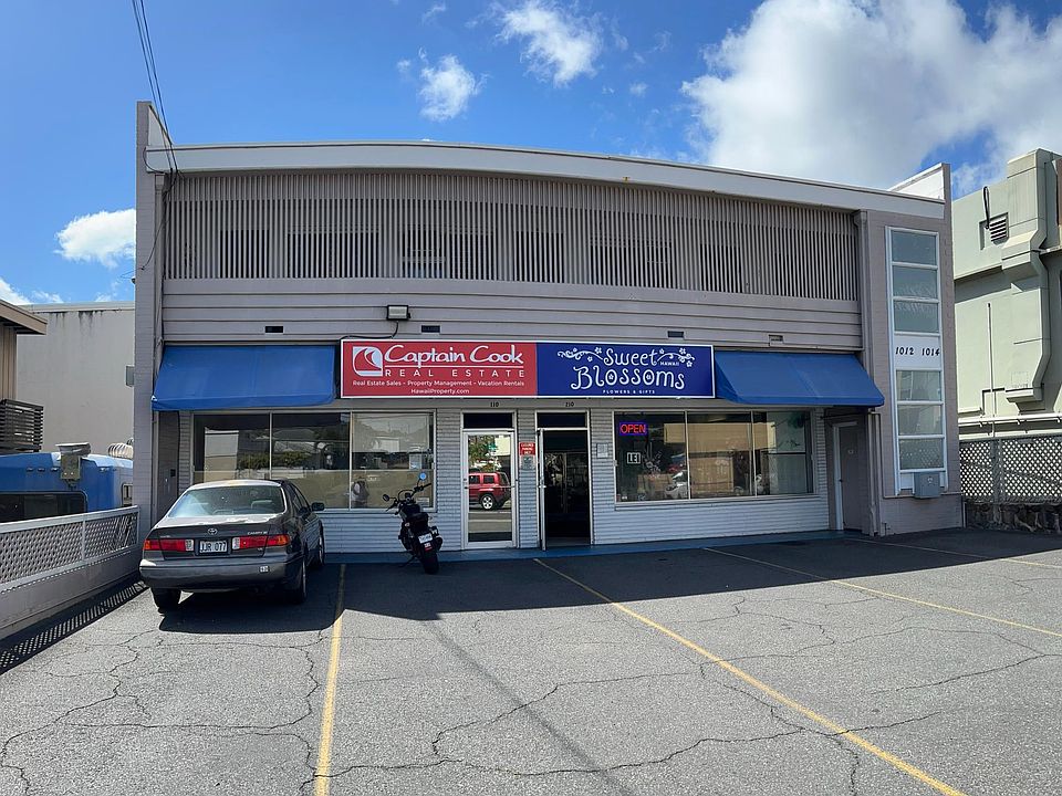 Two story building. Two tenants on first floor. Two tenants on second floor. One parking stall included