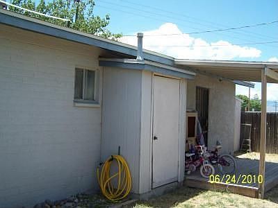 Covered Porch and Hot Water Shed