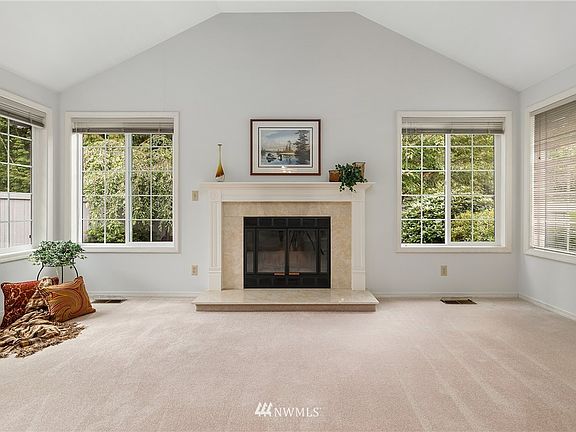Wood burning fireplace overlooking your private garden.