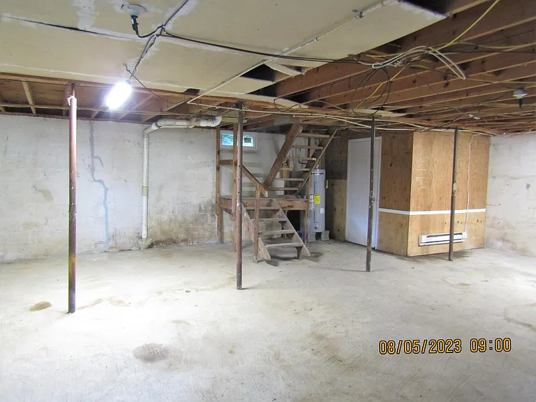 Basement with half bath & laundry room