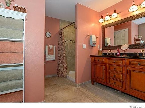 Bathroom with dual showers, and dual sinks!