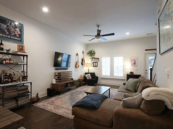 Large open living room with plenty of room for multiple furniture arrangements.