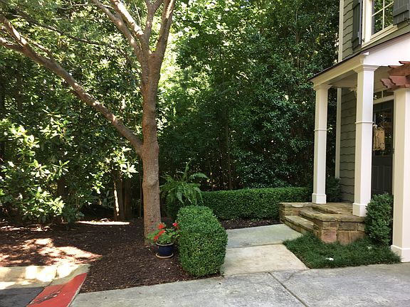 End unit w/woods & golf view