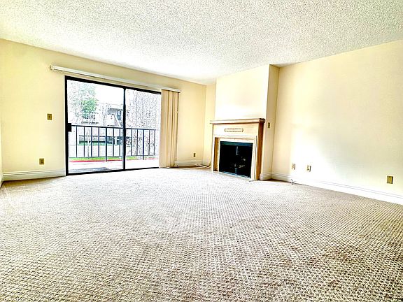 Extra Living space with fireplace and balcony access