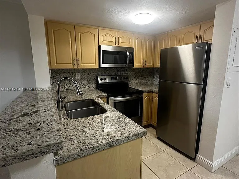 8660 NW 6th Ln #5-103 — Photo 3
