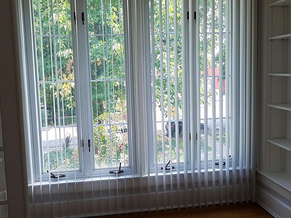 Study/office looking left at group of windows street view/front yard