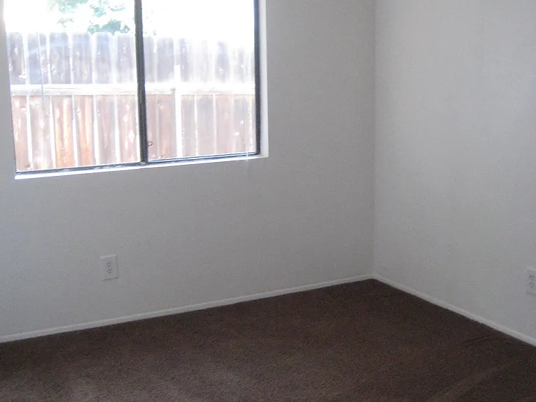 Very spacious Bedrooms with large closets. One bedroom faces the large grassy area, the other faces the Patio.