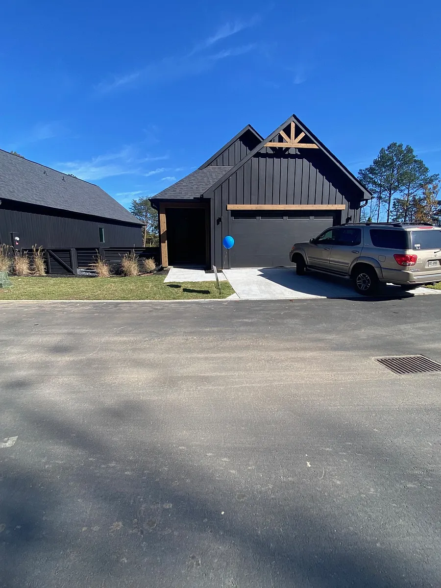 Photo 1 of 18 - 116 Marina Parc Dr - Waleska, GA Entry to two car garage - 116 Marina Parc Dr