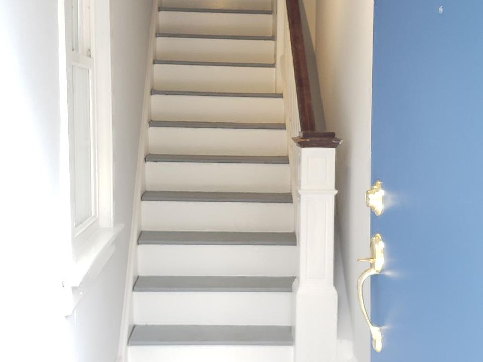 Entrance foyer with space for coat/shoe storage.