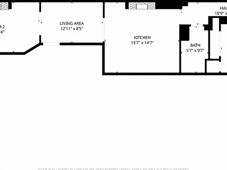 Floor Plan featuring back hallway to private parking pad.