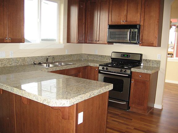 Granite counter with stainless appliances 