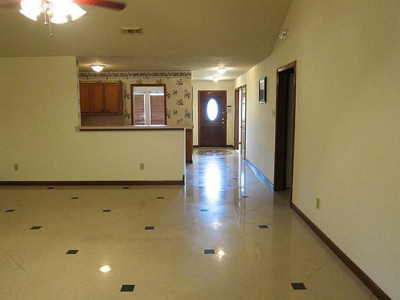 open floor plan; view as seen from the family room