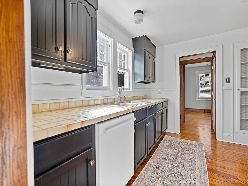 Kitchen with counter space and built-in cabinet