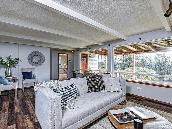 This amazing living room has plenty of space to have a living area, and the seating area if you choose, the alternative could be a dining room desk area where the chars are