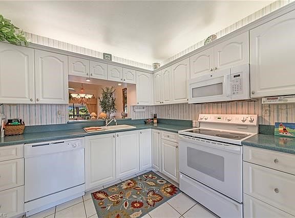 Kitchen view toward dining