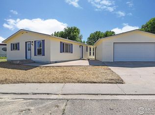 205 Crest Dr, Log Lane Village, CO 80705