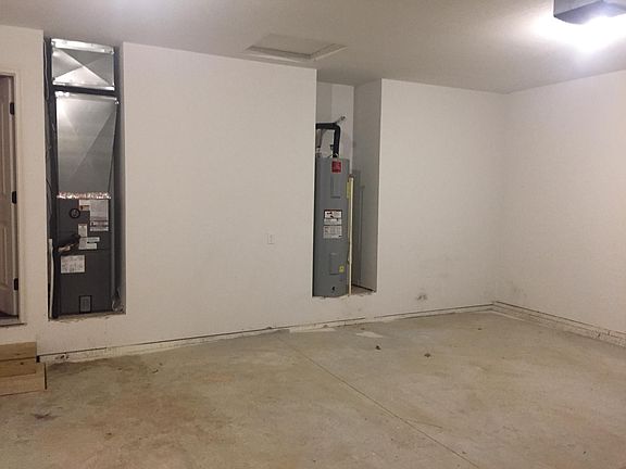 Garage is large with extra storage space
