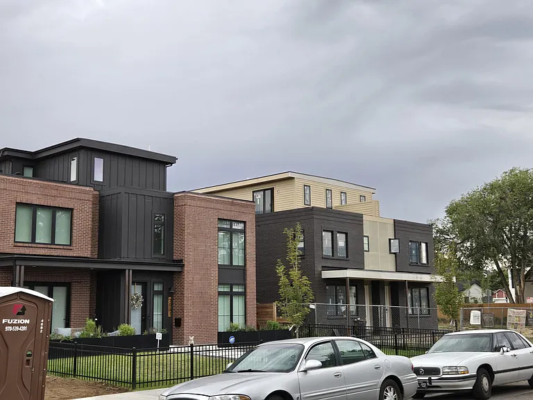 This affluent neighbor is one of Denver most sough after neighbors due to the Sloan's Lake park and close neighborhoods like Edgewater and the Highlands. These multi- million dollar houses across the street.