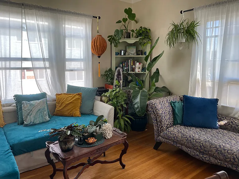 Living room as furnished by previous tenants