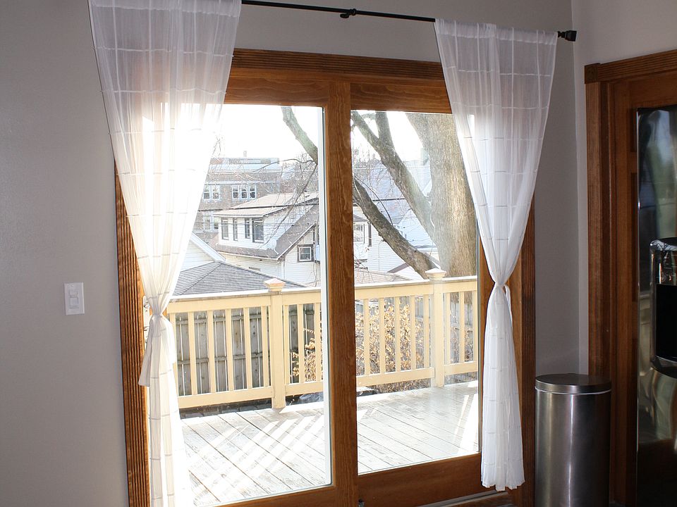 Door from ktichen to back deck & patio / garden area