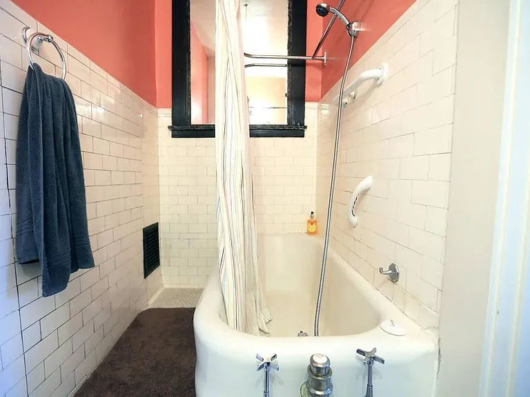 Classic soaking Tub and subway tile
