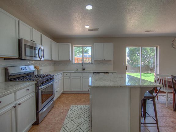 2nd image of 9908 Silverton Dr NW