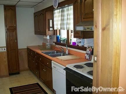 Kitchen
						:
						Dishwasher, electric stove, and refrigerator with Ice maker