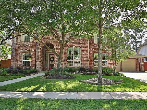 Sidewalks and full brick exterior.
