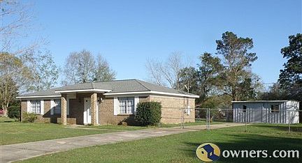 Front view of home and workshop in back yard