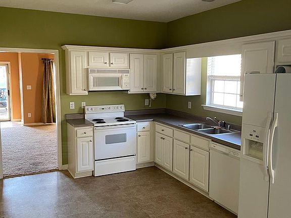Kitchen from back door towards den.