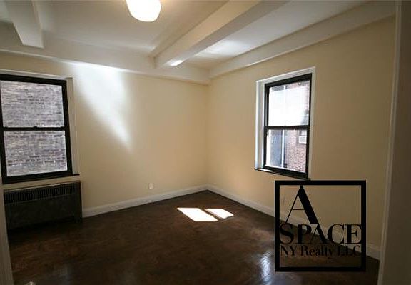 5th image of 211 E 11th St APT 4