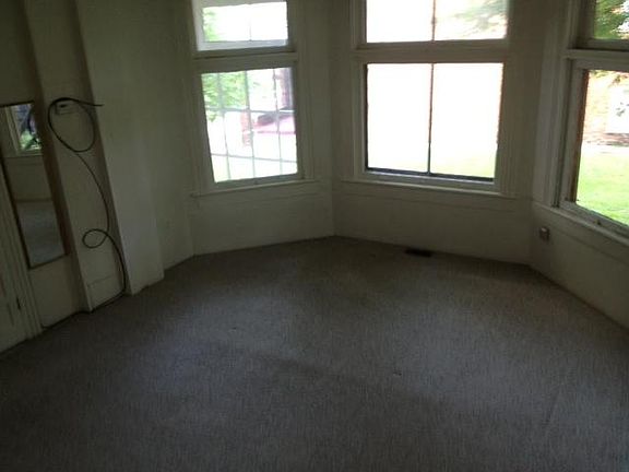 bedroom with bay windows
