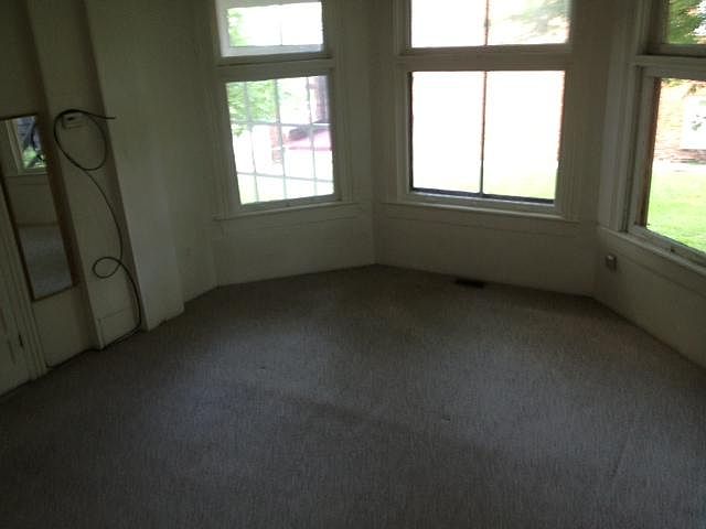 bedroom with bay windows