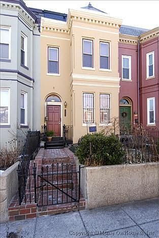 A Victorian Bay Front with classic Capitol Hill Charm