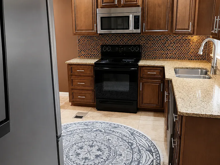 View of Kitchen from Bedroom which is being used as a Dining/Office Room