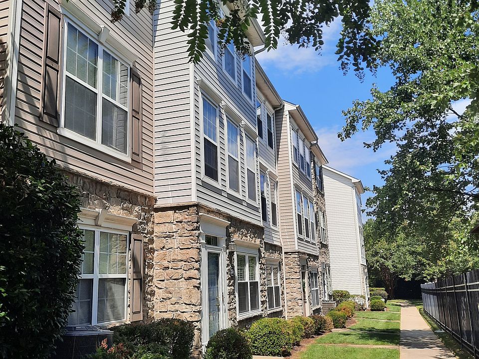 Three level garage town home in gated community at Parkside in Ashburn .