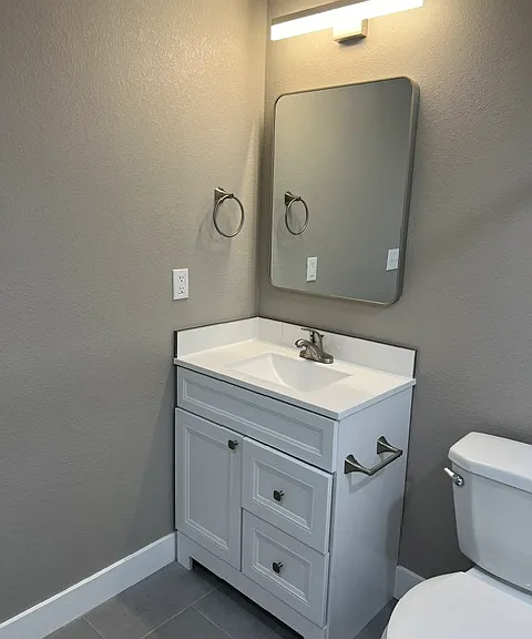 BASEMENT BATHROOM.