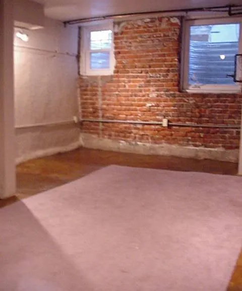 view of room from across stairs landing