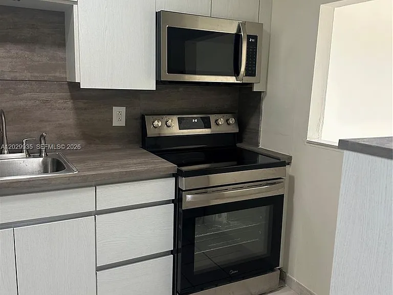1075 W 68th St #309 — Photo 2
