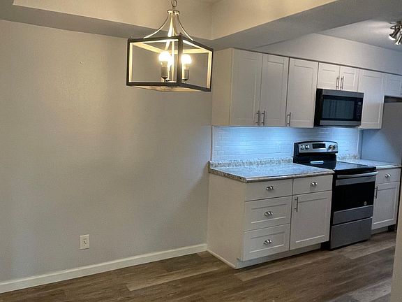 Cute dining area off the kitchen - updated paint, lighting, flooring