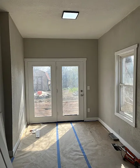 Largest Bedroom w/ door to Deck and back yard.