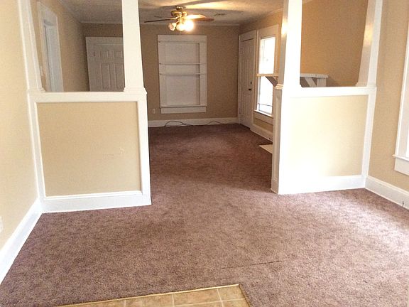 View of dining room and living room from kitchen