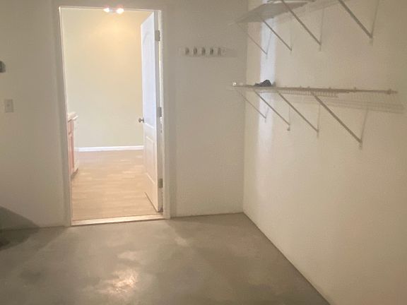 Additional photo inside of garage looking into kitchen