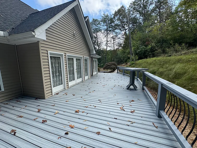 Bigger new deck. Old deck photo in group of photos.